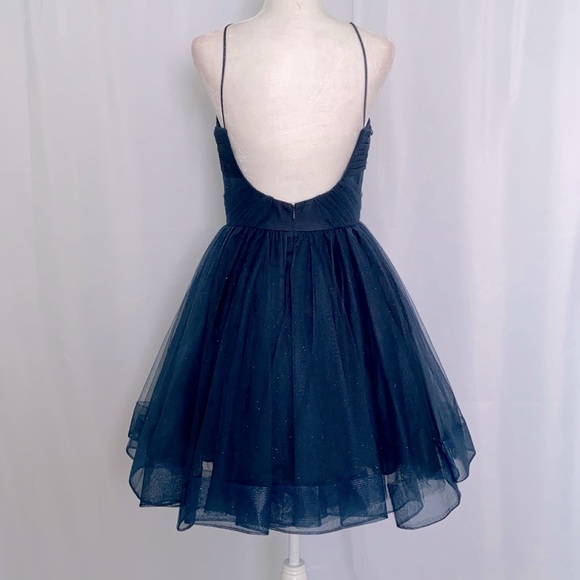 🤩 Glamour by Terani Couture
Sweetheart Neck Glitter Tulle Skirt Dress - Picture 7 of 9